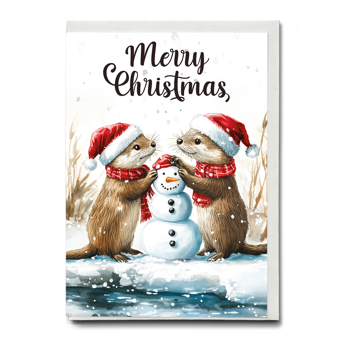 Two otters building a snowman - Greeting Card