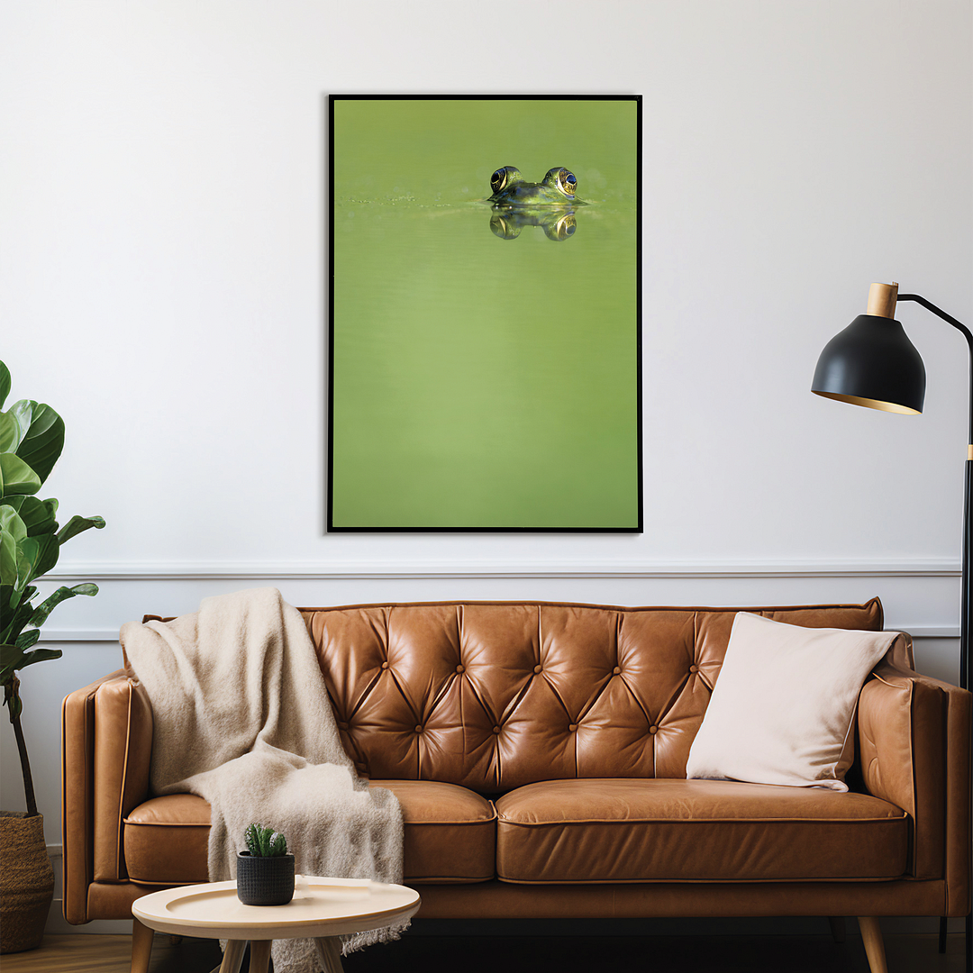 Green frog swimming in the water. - Art Print
