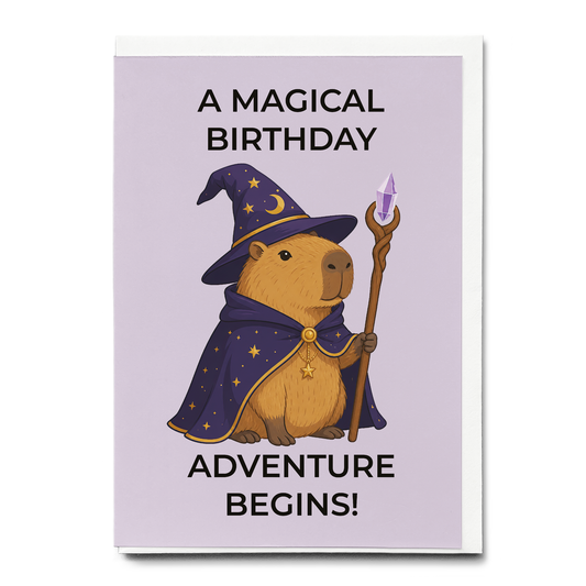 A magical birthday adventure begins! (Capybara wizard) - Greeting Card