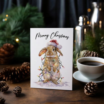 Cute bunny tangles in Christmas lights - Greeting Card