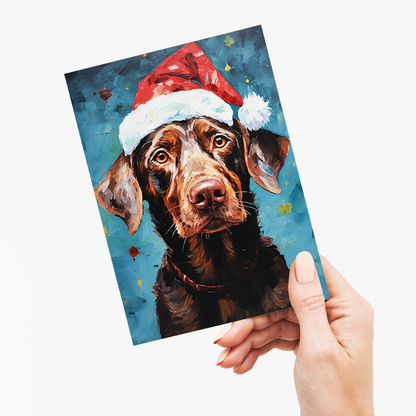Painting of a brown labrador wearing a Christmas hat - Greeting Card