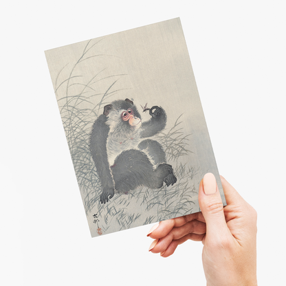 Monkey with insect By Ohara Koson - Greeting Card