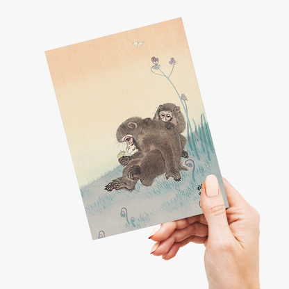 Two monkeys with a butterfly by Ohara Koson - Greeting Card