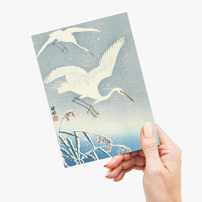 Descending egrets in snow - Greeting Card