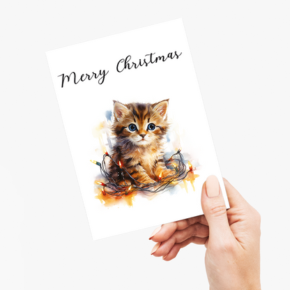 Kitten tangled in Christmas light - Greeting Card
